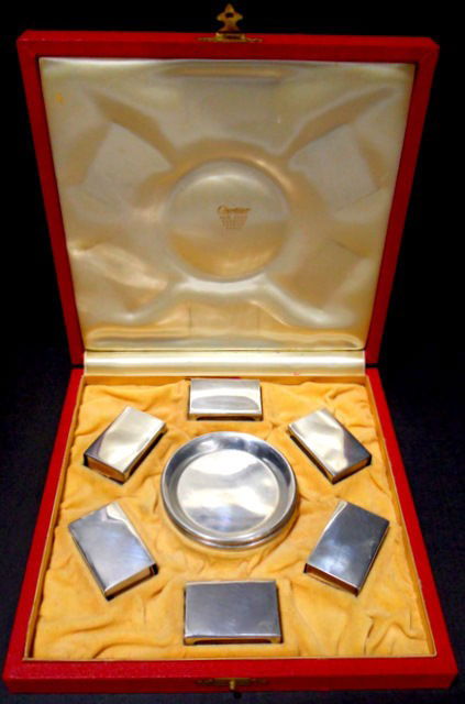 Cartier Sterling Ashtray and Matchbox Set (10 pc.): Excellent vintage Cartier sterling silver ashtray and matchbox set in custom velvet-lined presentation box, from the 1950's. Each piece is marked Sterling and signed Cartier. Matchbox weighs - 0.53 to