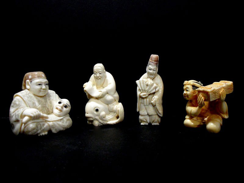 Chinese Ivory Netsuke Male Figures (4): Chinese ivory netsuke male figures. There are four figures in total, and each one is different. One depicts an old man sitting atop a fish; another portrays a standing male holding a fan; the third on