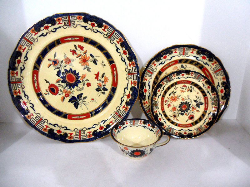 Masons Ironstone Oriental China Set (60 pcs.): Traditional Mason's oriental pattern dish set in a rich palette of deep blue, orange and gold featuring 12 dinner plates - 11" diameter, 12 saucers - 6" diameter, 12 cups - 2 1/4" high x 4 3/4" wide,