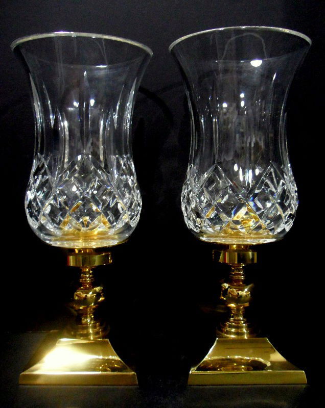 Waterford Lismore Hurricane Lamps (2): Two, stunning Waterford crystal and brass hurricane lamps. These two lamps would look great on any table. Both lamps have Waterford logo on base of the lamps. Brand new in original boxes. Model #10048