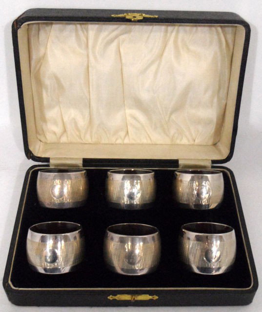 J. Gloster Ltd. Sterling Silver Napkin Rings (6): Magnificent set of six sterling silver napkin rings by J. Gloster Ltd. Each napkin ring is incised with an elaborate geometric patter and contains a cartouche with a number from 1-6. The pieces are li