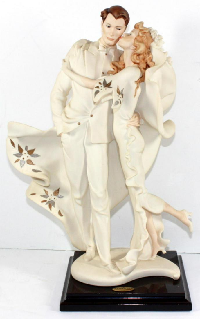Giuseppe Armani Kissing Couple Figurines: Giuseppe Armani kissing married couple figurines comes with original box measures 14" H x 9 " L x 5 1/2" W