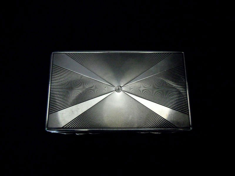 Crisford & Norris Sterling Silver Case: Sterling silver case by Birmingham silversmiths Crisford & Norris. The exterior of the case is decorated in a beautiful art deco pattern. C & N for Crisford & Norris is stamped inside the case as well
