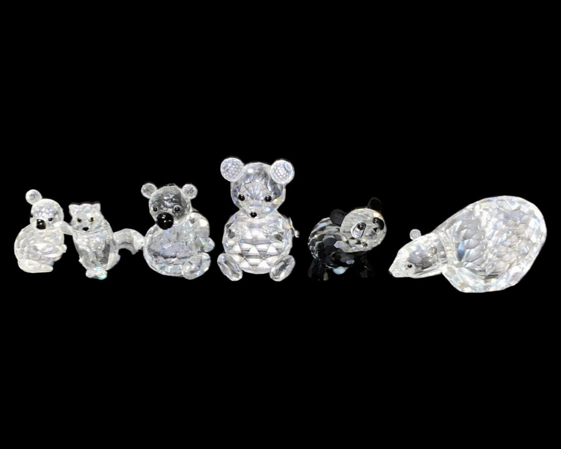 Lot of Six Swarovski Crystal Figurines: Lot of Six Swarovski Crystal Figurines includes Polar Bear measures H: 1 1/2", Koala H: 2", Cat H: 1 3/4", Bear H: 2 3/8", Panda H: 1 3/4" and another Koala H: 1 1/2"