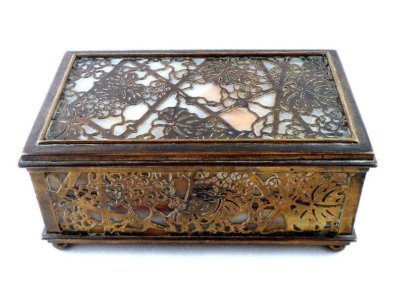 Tiffany Studios Cigarette Case: Tiffany Studios bronze and slag glass cigarette case in the grapevine pattern. The beautiful grapevine pattern is in bronze over white colored slag glass. The inside of the box is lined with cedar. Bo