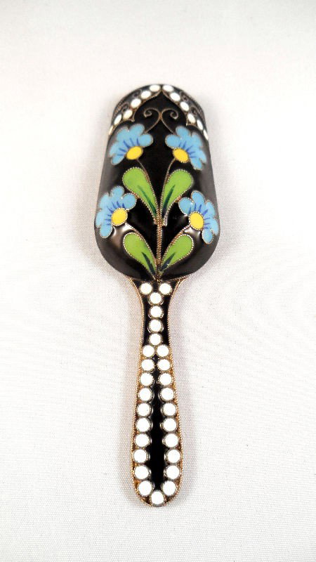 Russian 916 Silver & Enamel Sugar Scoop: Russian 916 silver and enamel sugar scoop. The piece, with a gold wash, is decorated in a black ground with bright colored enameled floral designs. Maker and Kokoshnik marks are stamped into the insid