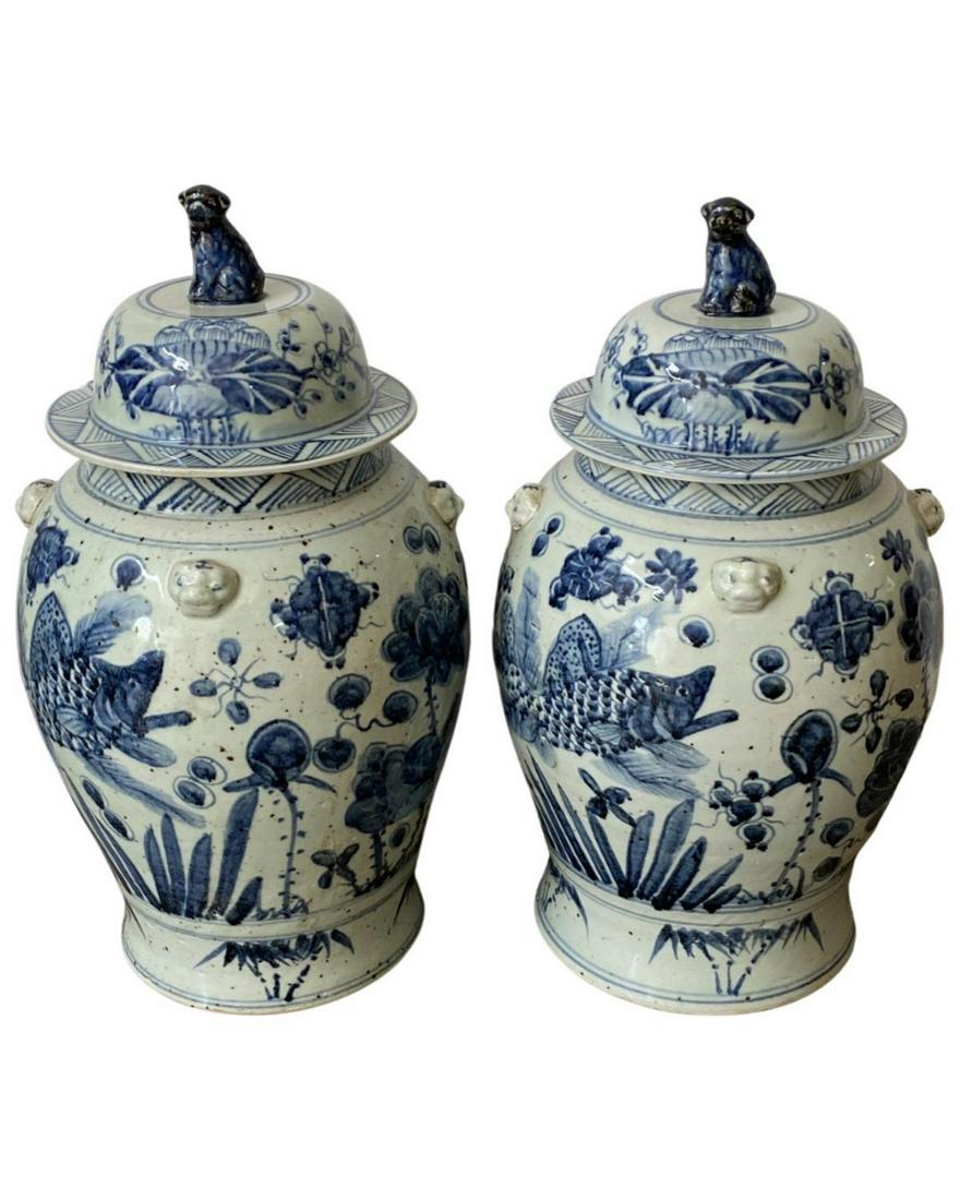Pair of Chinese White and Blue Porcelain Covered Jar: Pair of Chinese White and Blue Porcelain Covered Jar measures H: 20". One has minor chip on cover, sold as is