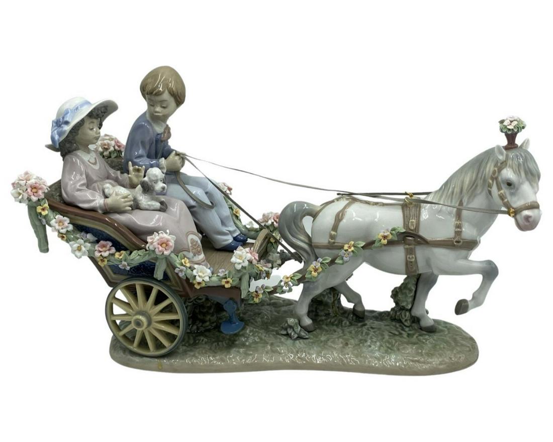 Lladro #5718 A Ride in the Park Boy & Girl in Horse Carriage: Lladro #5718 A Ride in the Park Boy & Girl in Horse Carriage. Lladro back stamped aculpture b Antonio Ramos measures H: 9 1/2" x L: 16". Retail price $2,000
