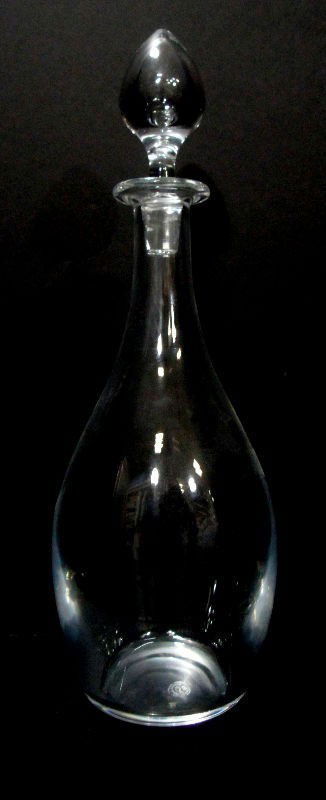 Baccarat Crystal Dom Perignon Decanter: Baccarat crystal Dom Perignon decanter. This piece beautifully clear and contains the Baccarat mark etched on the bottom. 12 3/4"H. Shipping within the continental US is $40 plus Required insurance. F