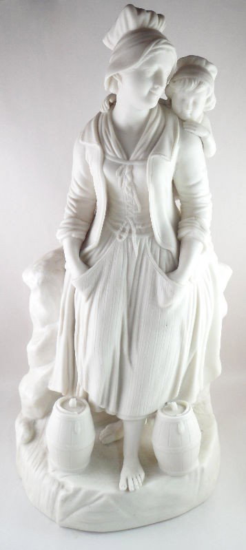 Parian Figure of a Mother and Child: Parian figure of a mother and child. The mother stands with her hands in her pockets and has two barrels by her feet; her small child clings onto her back. The piece is beautifully crafted and contain