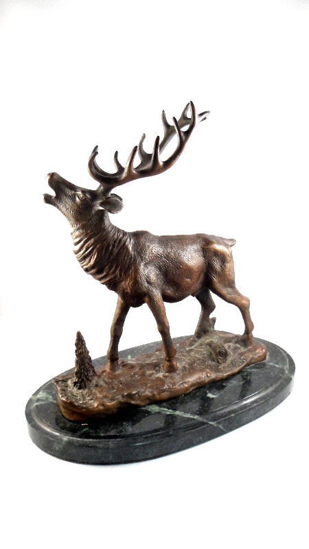 Bronze Sculpture of a Stag After Pierre Jules Mene: Bronze sculpture of a stag after Pierre Jules Mene. Piece has a beautiful dark patina. Rests on a marble base. Signed on the side. Measures 8 3/4"H, base measures 1"H. Shipping within the continental 