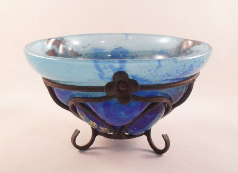 Daum Nancy & L. Majorelle Glass Bowl: Daum, Nancy and Louis Majorelle glass bowl with wrought iron mounts. This beautiful blue art deco piece features gold inclusions. Bowl measures 4 1/2"D, bowl on mount measures 2 3/4"H. Shipping within