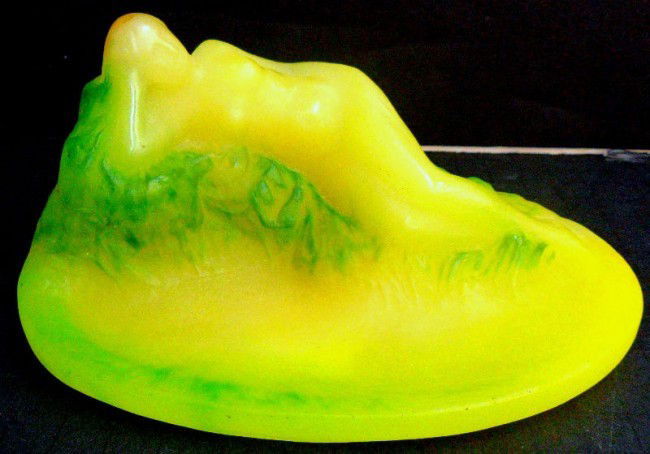 Daum Nancy Pate de Verre Paperweight: Magnificent Daum Nancy Pate de Verre glass paperweight featuring a three-dimensional nude in yellow and green. Signed A. Walter Nancy on top. Circa 1920, France. Measures 1 1/4" high x 7" wide. For Do