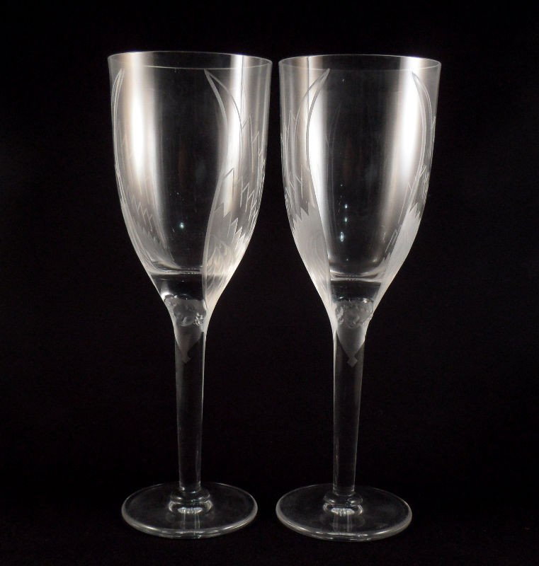 Lalique Crystal Angel Champagne Flutes (6): Lalique Crystal angel champagne flutes, set of 6. Featuring sparkling clear crystal with raised frosted angel figure at top of each stem. Made in France. In original boxes. All signed Lalique France o