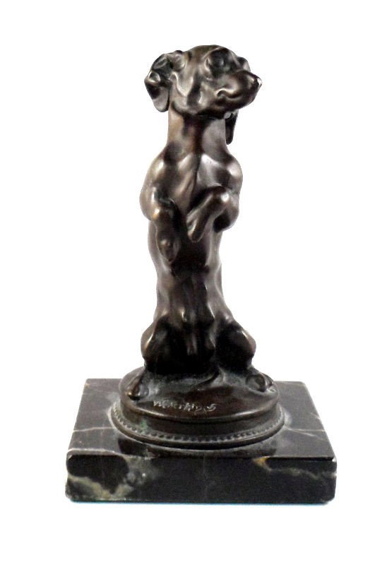 Bronze Dachshund Figurine, Signed: Signed bronze sculpture of a Dachshund. The works is signed "Wederkinch" and also contains a foundry stamp. Sits atop a marble base. Measures 7"H including base. For Domestic and international shippin