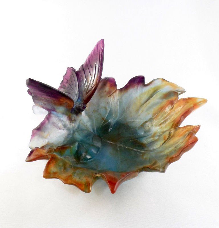 Daum France Pate De Verre Glass Dish: Daum France pate de verre glass dish. The dish is modeled in the shape of an oak leaf with a stunning butterfly perched at the stem. The glass is mottled amber, purple, blue and green. Etched Daum Fra