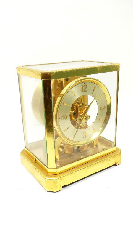 Le Coutre Co. Atmos Clock: Atmos clock by Le Coutre Co. This is a perpetual clock, which automatically winds due to changes in the atmosphere. Movements are marked Le Coutre Co. Made in Switzerland. Measures 9 1/4" X 8 1/2" X 6