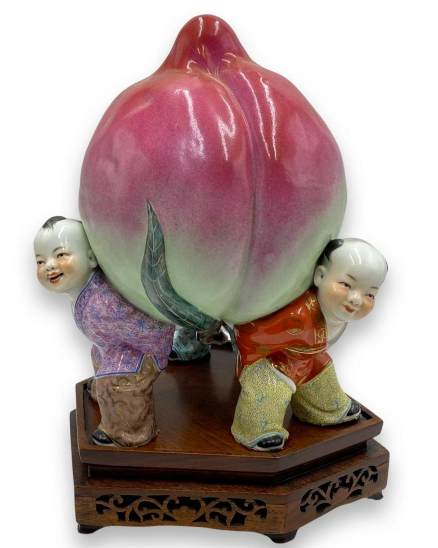 Chinese Hand Painted Porcelain Figural Three Boys Holding Large Longevity Peach with Wood Stand (1 of 2)