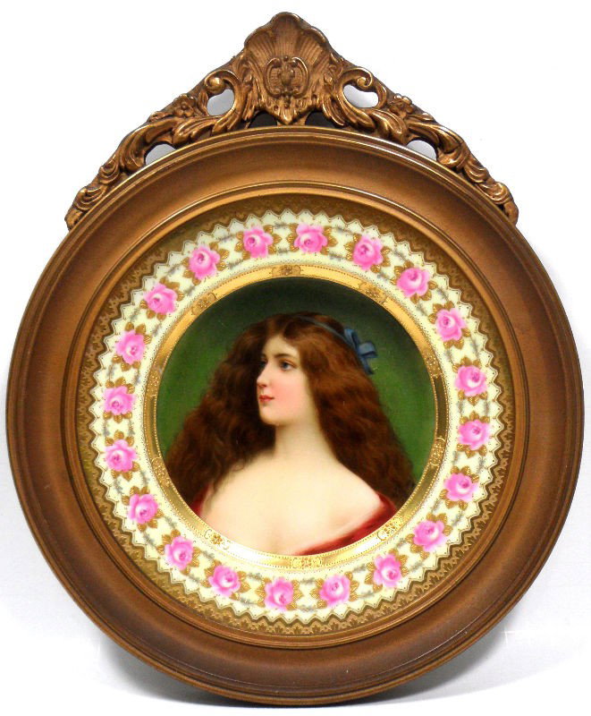 Royal Vienna Wagner Signed Portrait Plate: Royal Vienne Wagner signed portrait plate. The center of the plate is painted with a portrait of a beautiful young woman. Wagner's signature can be found towards the bottom of the portrait in the sitt