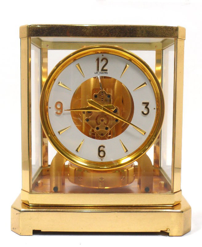 Le Coutre Co. Atmos Clock: Atmos clock by Le Coutre Co. This is a perpetual clock, which automatically winds due to changes in the atmosphere. Movements are marked Le Coutre Co. Made in Switzerland. Measures 9 1/4" X 8 1/2" X 6