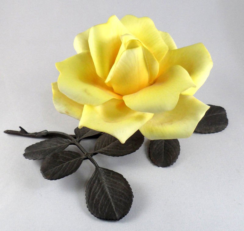 Royal Worcester Bronze Porcelain Yellow Rose: Royal Worcester bronze and porcelain yellow rose entitled "Irish Gold." Limited edition from the Roses of Honor collection. This thin bone china and bronze sculpture measures 6 1/4"L X 4 1/4" W X 4 1/