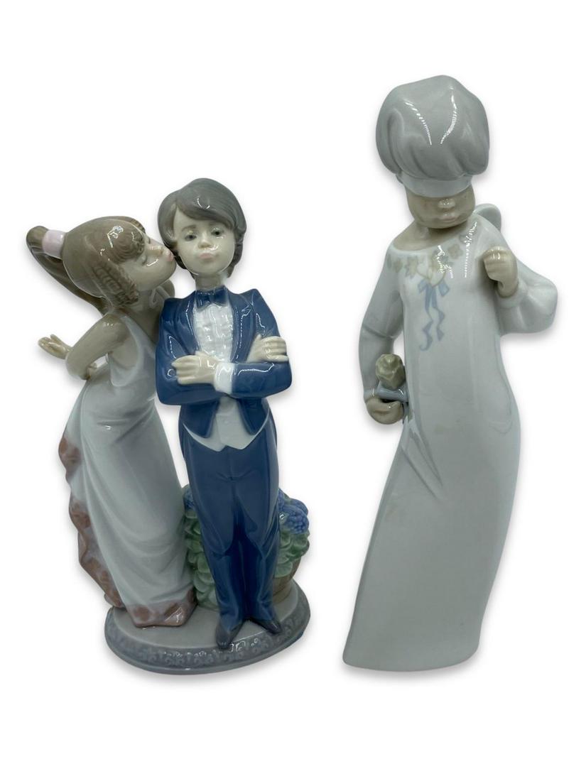 Pair of Lladro Porcelain Figurines: Pair of Lladro Porcelain Figurines includes #4607 Cupid & #5555 Lets Make Up. Largest measures 9 1/2"