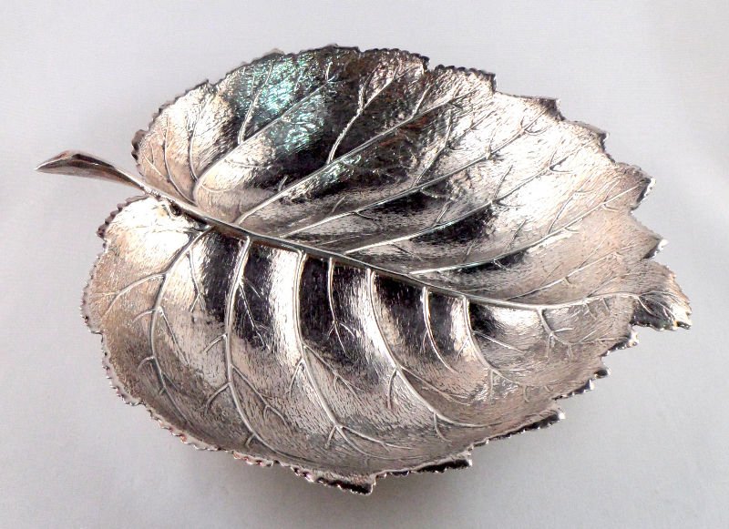 Gianmaria Buccellati Sterling Leaf Tray: Gianmaria Buccellati sterling silver flower tray. Measures 8 1/4" from stem to point of leaf and 7 3/8" in width. Underside of leaf is stamped Gianmaria Buccellati, 925. For shipping and insurance quo