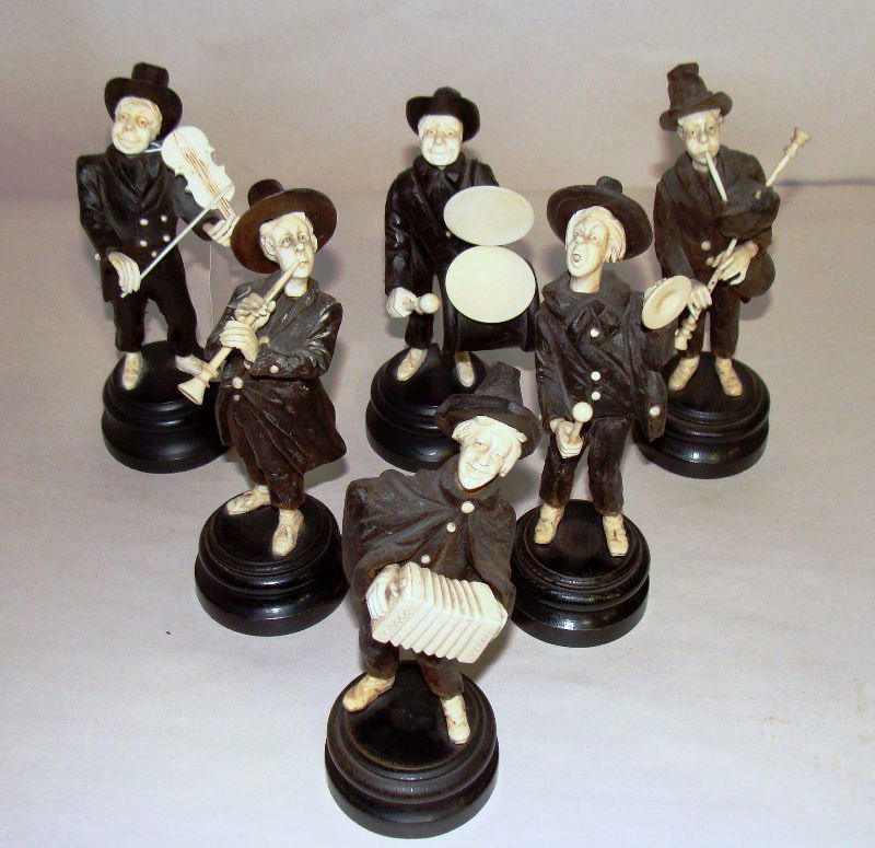 6 PIECE IVORY & WOOD MUSICIAN BAND SET: Ivory & Wood 6 Pc set of musicians on round wooden bases. Each playing a different instrument. (Bag pipe, symbols, flute, accordion, drum and violin). Figures stands approx 6 1/4" to 6 3/4" on a 1 3/4