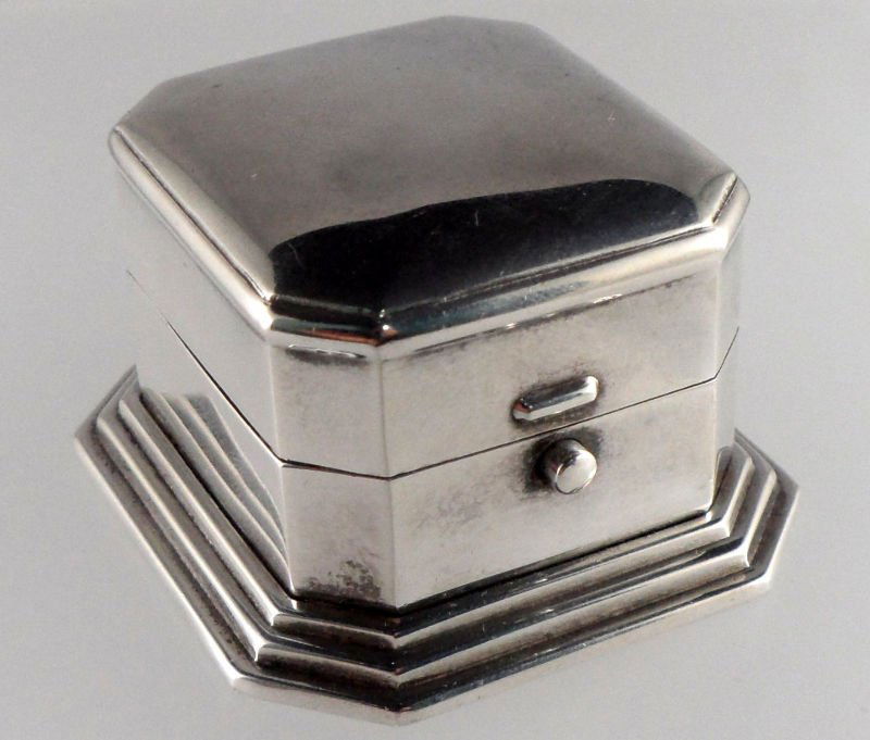 Birks Sterling Silver Ring Box: Beautifurl Birks sterling silver ring box with hinged top. Gold wash Briks logo on inside and marked Birks sterling on bottom. Approx 1 1/4" x 1 3/4". Weight 2.20 toz. For shipping and required insura