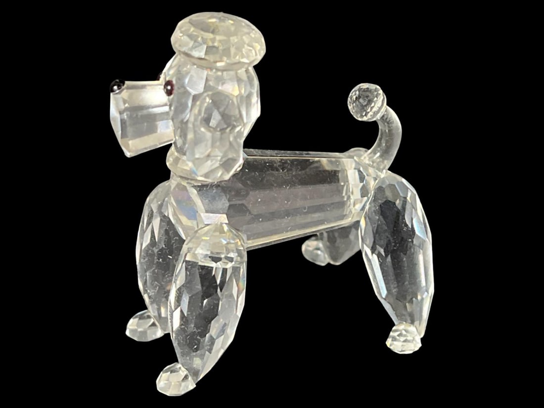 Swarovski Crystal Poodle Figurine: Swarovski Crystal Poodle Figurine measures H: 2 1/8" x W: 1 7/8"