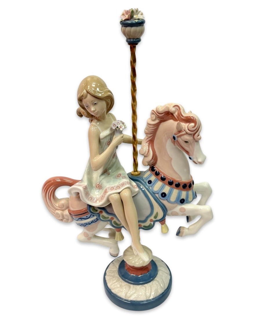 Lladro 1469 Girl on Carousel Horse Porcelain Figurines: Lladro 1469 Girl on Carousel Horse Porcelain Figurines measures H: 15"