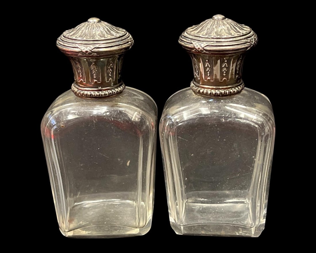 Pair of Sterling Silver & Crystal Container Flasks: Pair of Sterling Silver & Crystal Container Flasks measures H: 4 1/8"
