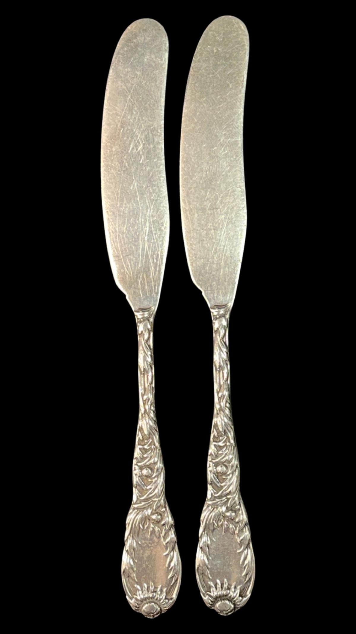 Pair of Tiffany & Co Sterling Silver Chrysanthemum Butter Spreaders: Pair of Tiffany & Co Sterling Silver Chrysanthemum Butter Spreaders L: 5 3/4", weighs 1.60 OZT