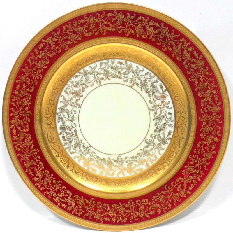 Hutschenreuther Royal Bavarian Dinner Plates (12): Hutschenreuther Royal Bavarian Dinner Plates set of 12, Gilt border and floral design on cranberry with cream colored center. Measures 10 5/8'. For shipping and insurance quotes please call Ryan or Da