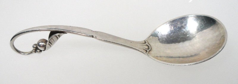 Georg Jensen Sterling Silver Berry Spoon: Antique Georg Jensen sterling silver berry spoon. Marked 21 George Jensen Sterling Denmark on back. Oldest mark 1904-1908. Measures approximately 4 1/4" in length. For shipping and insurance quotes pl