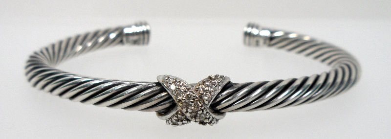 David Yurman Pave Diamond Sterling Bracelet: David Yurman Pave diamnd sterling silver bracelet. This signature David Yurman bracelet features its classic cable design with a ave diamond criss-cross accent. Fully hallmarked on back. For shipping 