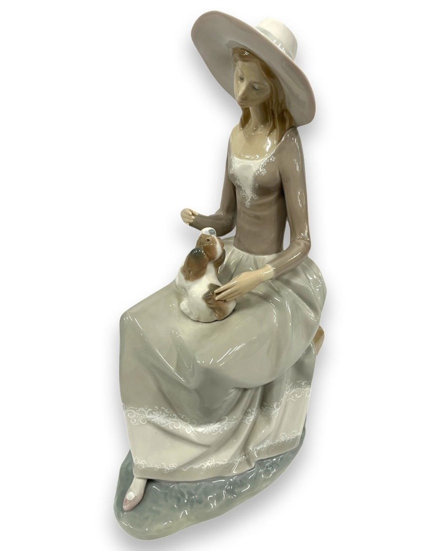 Lladro #4806 Girl with Dog Porcelain Figurines: Lladro #4806 Girl with Dog Porcelain Figurines measures H: 13"