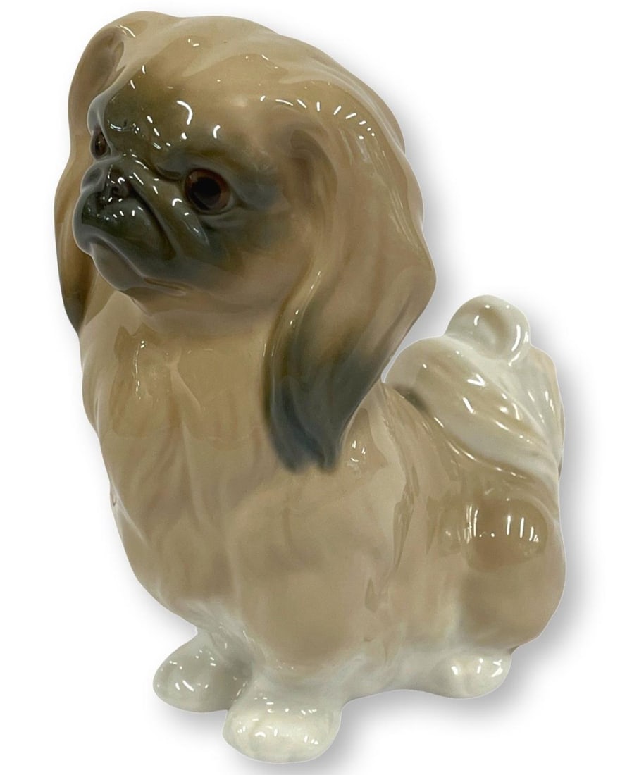 Lladro Porcelain Pekingese Dog Figure: Lladro Porcelain Pekingese Dog Figure measures H: 6"