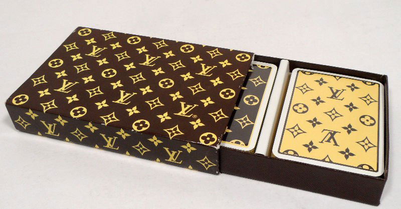 Rare Louis Vuitton Boxed Set Playing Cards: Rare and elegant Louis Vuitton boxed set of playing cards. Measures 5 1/2''L x 1'' H. For shipping and insurance quotes please call Ryan or Dave at Eagle Shipping Center (561)-932-0700 or email ryan@e