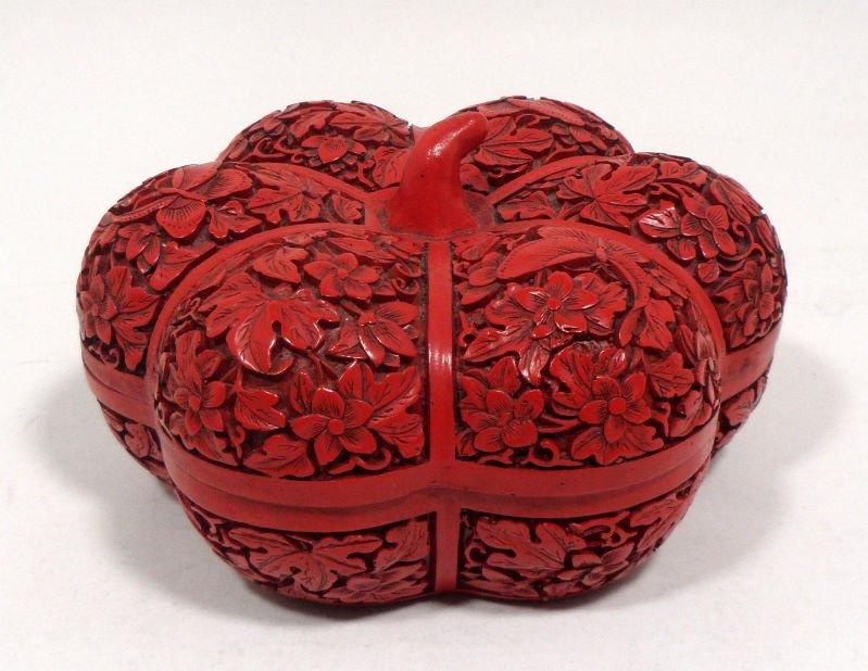 Chinese Cinnabar Covered Bowl: Chinese carved cinnabar red pepper shaped covered lacquered box measures 5 1/2'' x 3''. For shipping and insurance quotes please call Ryan or Dave at Eagle Shipping Center (561)-932-0700 or email ryan