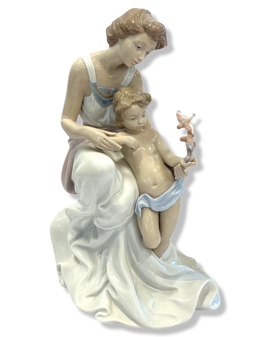 Lladro #7649 Where Love Begins Porcelain Figurines: Lladro #7649 Where Love Begins Porcelain Figurines measures 13 1/2"
