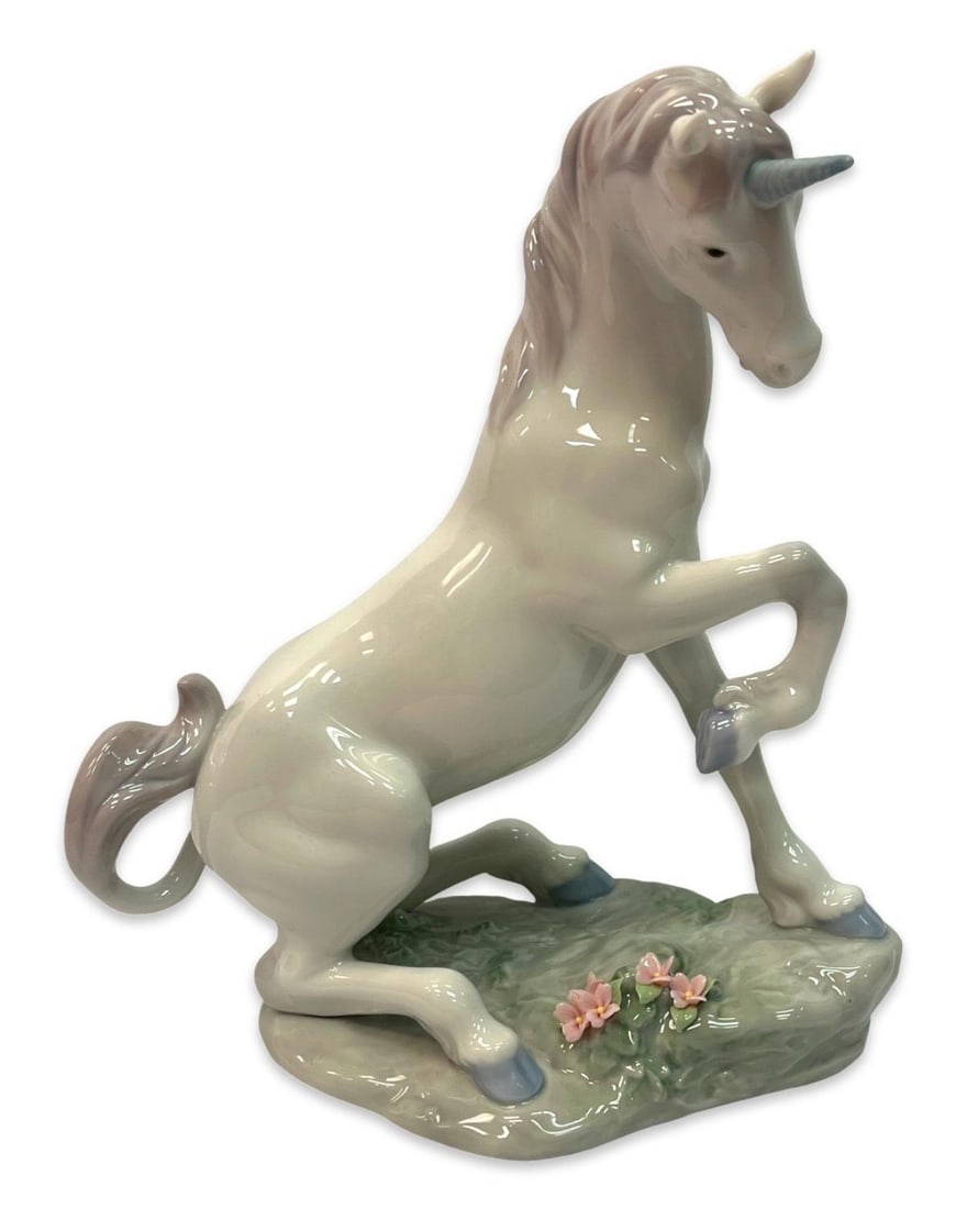 Lladro #7697 Magical Unicorn Porcelain Figurine: Lladro #7697 Magical Unicorn Porcelain Figurine measures H: 8 1/2"