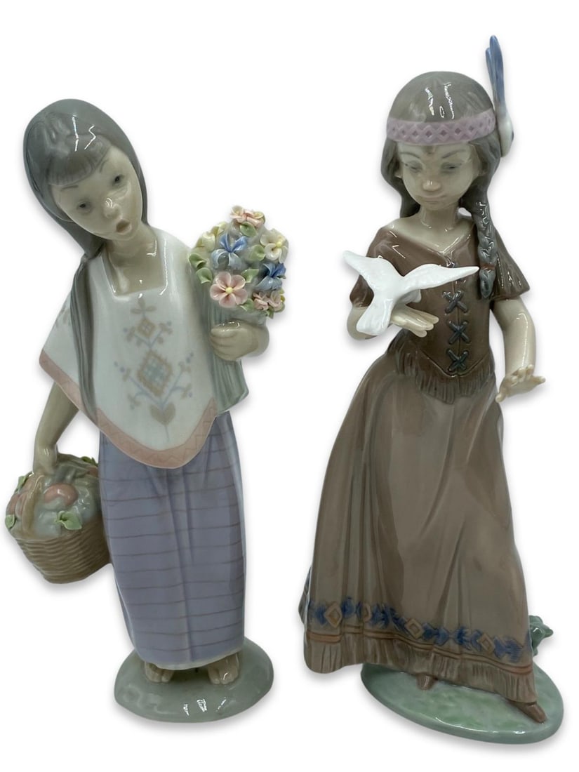 Pair of Lladro Porcelain Figurines: Pair of Lladro Porcelain Figurines includes #6153 American Love & #1058 Lupita. Largest measures H: 8 3/4"