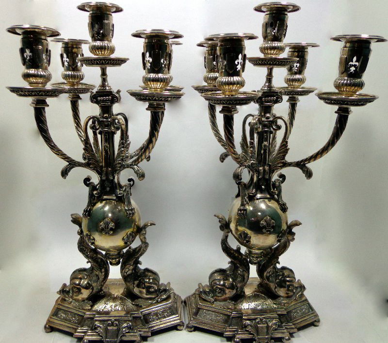Pair of Birk Sterling Figural Candelabra: Pair of Birk sterlig silver five light candelabras. Has a fish and fleur de lys design. Measures 19" height x 13 1/2" , weighs 218 toz. For Domestic or International Shipping Quotes Please Feel Call R