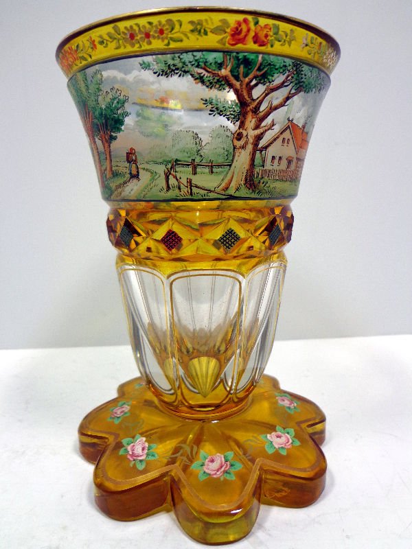 Moser Amber Cut To Clear Chalice: Moser amber cut to clear chalice with flower decoration and a landscape scene. Measures 6 1/4 inches high x 4 1/2 inches wide. For shipping and insurance quotes please call Ryan or Dave at Eagle Shipp