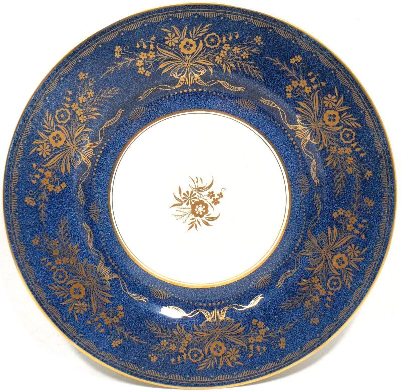 (12) Mintons English Bone China Dinner Plates: (12) Mintons English Bone China Dinner Plates with a gilt floral design on a cobalt blue mottled background with a gilt floral design in the center. Made in England. Measures 10 1/2 inches in diameter