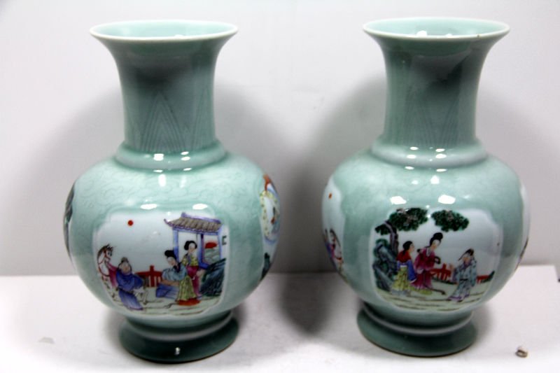 Pair of Chinese Porcelain Vases: Pair of Chinese porcelain vases depicting figures, they have been drilled. Measures 10 3/8''H x 6 3/4'' D. For Domestic or International Shipping Quotes Please Feel Call Ryan or Dave at Eagle Shipping