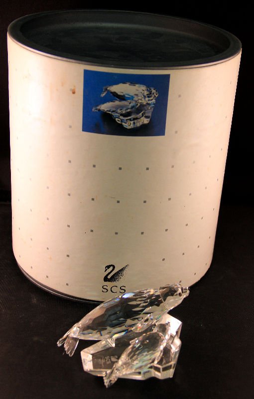 Swarovski Crystal 1991 "Save Me" Annual Edition: Swarovski crystal "Save Me" the seals 1991 annual edition in original box. Part of the collectors society. Measures 2 1/8" high x 2 1/2" wide x 3 3/4" depth. For Domestic or International Shipping Quo
