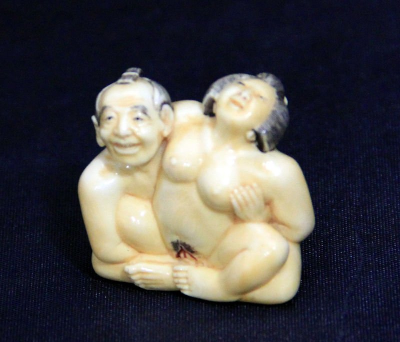 Chinese Erotic Two Figure Netsuke: Chinese ivory 2 figure netsuke. Measures 1 1/2" high x 1 1/2" wide. For Domestic or International Shipping Quotes Please Feel Call Ryan or Dave at Eagle Shipping Center 561-932-0700 or email them at r
