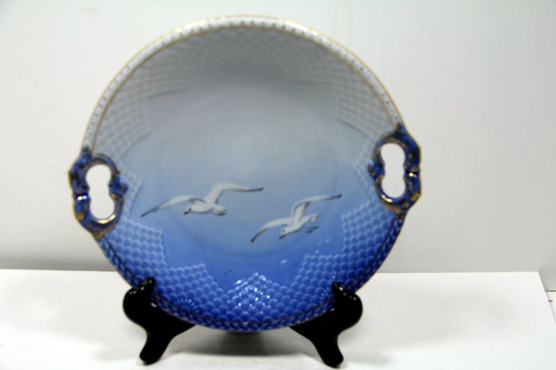 Royal Copenhagen B&G Seagull Cake Dish: Royal Copenhagen B&G Seagull with gilt trimming two handled Cake Dish. Stamped in the back Compenhangen Porecelain, B&G, Made in Denmark.For Domestic or International Shipping Quotes Please Feel Call 